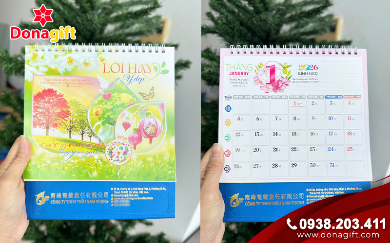 Lịch để bàn in logo Thêu Nam Phong đế xanh dương do DonaGift sản xuất
