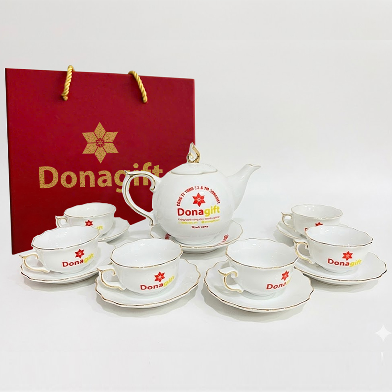 Bộ ấm chén sứ trắng viền vàng in logo Donagift